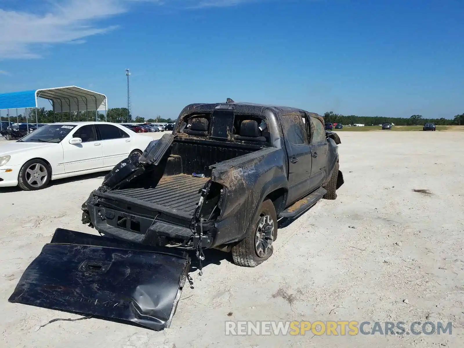 4 Photograph of a damaged car 3TMCZ5AN1KM237865 TOYOTA TACOMA 2019