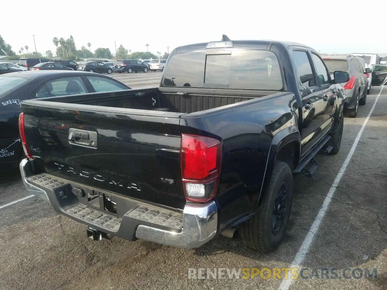 4 Photograph of a damaged car 3TMCZ5AN1KM238546 TOYOTA TACOMA 2019