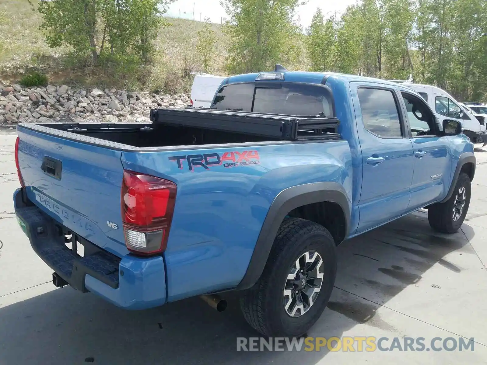 4 Photograph of a damaged car 3TMCZ5AN1KM242368 TOYOTA TACOMA 2019