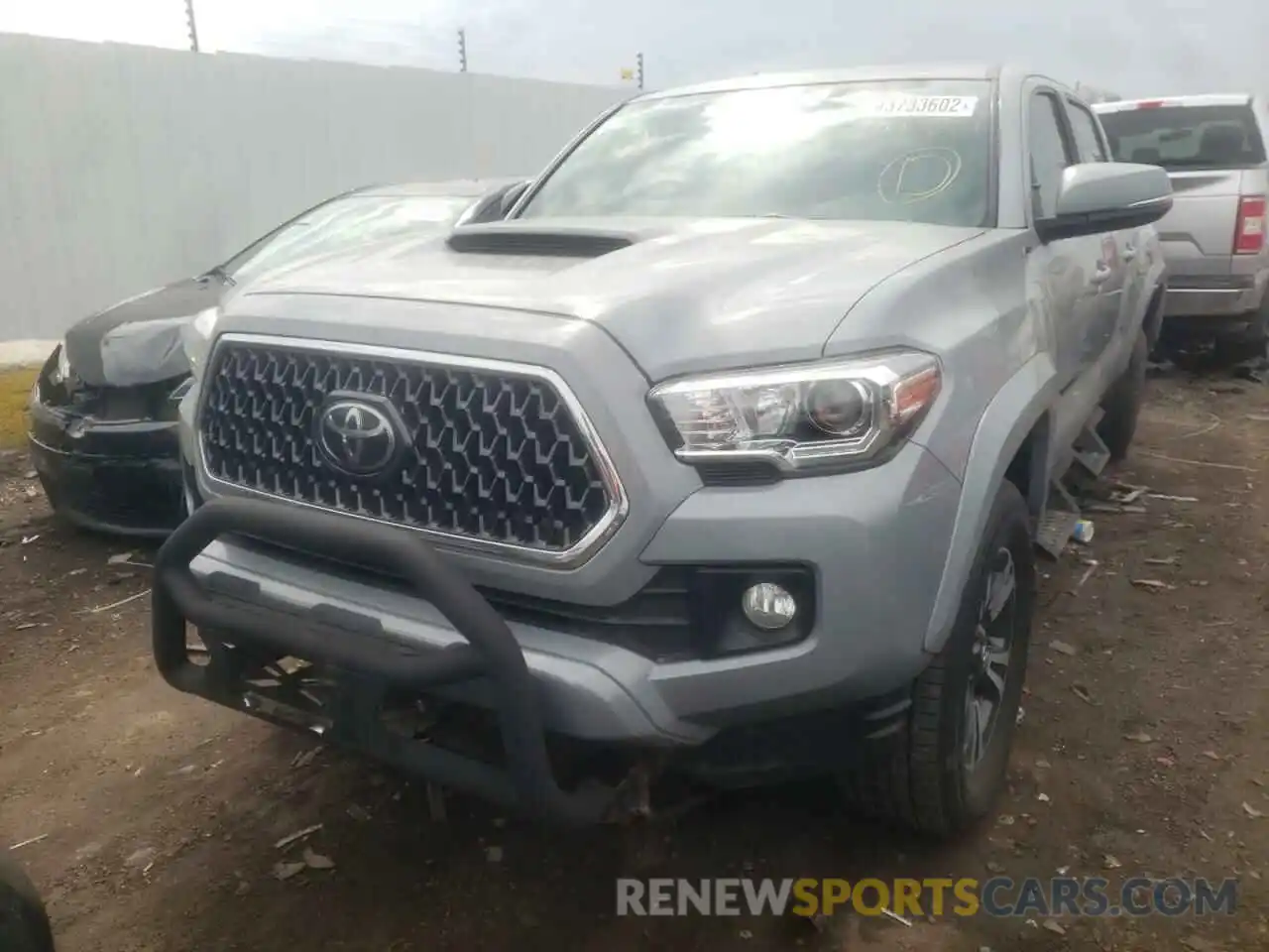 2 Photograph of a damaged car 3TMCZ5AN1KM242791 TOYOTA TACOMA 2019