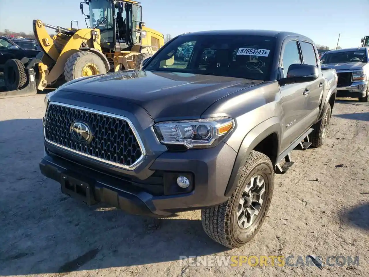 2 Photograph of a damaged car 3TMCZ5AN1KM243293 TOYOTA TACOMA 2019