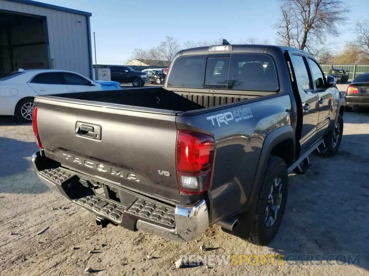 4 Photograph of a damaged car 3TMCZ5AN1KM243293 TOYOTA TACOMA 2019