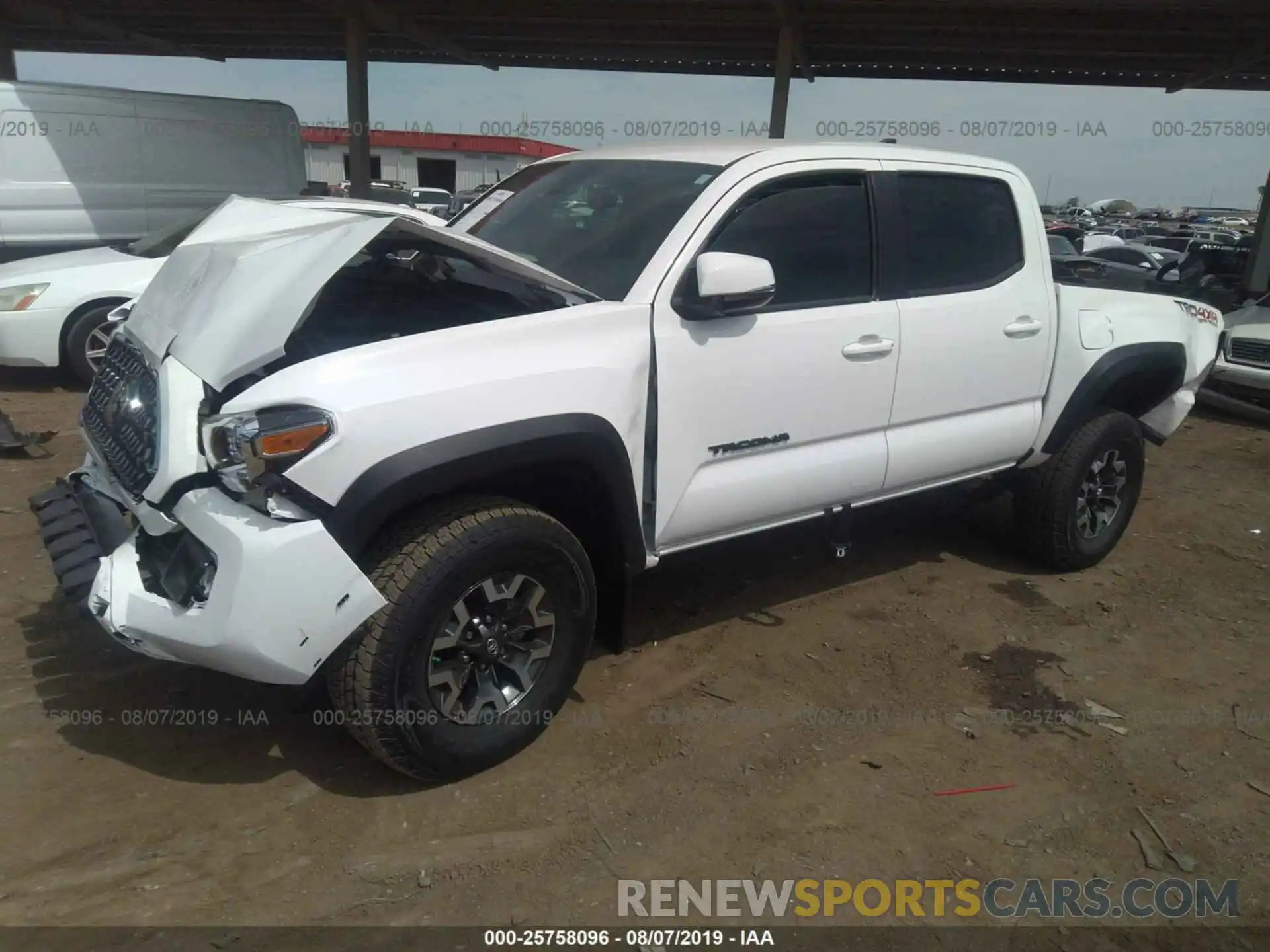 2 Photograph of a damaged car 3TMCZ5AN1KM243763 TOYOTA TACOMA 2019