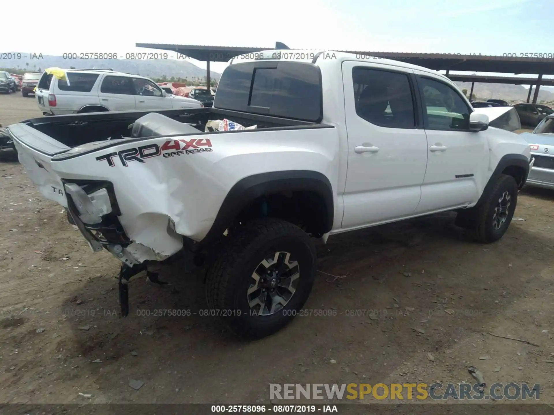 4 Photograph of a damaged car 3TMCZ5AN1KM243763 TOYOTA TACOMA 2019