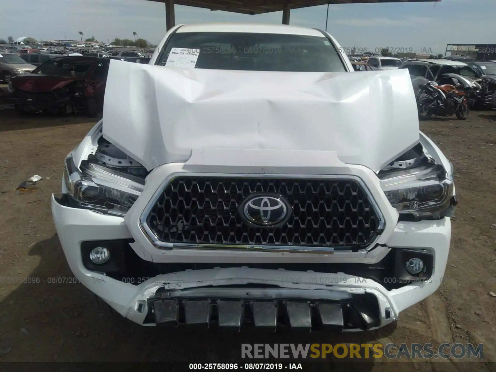 6 Photograph of a damaged car 3TMCZ5AN1KM243763 TOYOTA TACOMA 2019