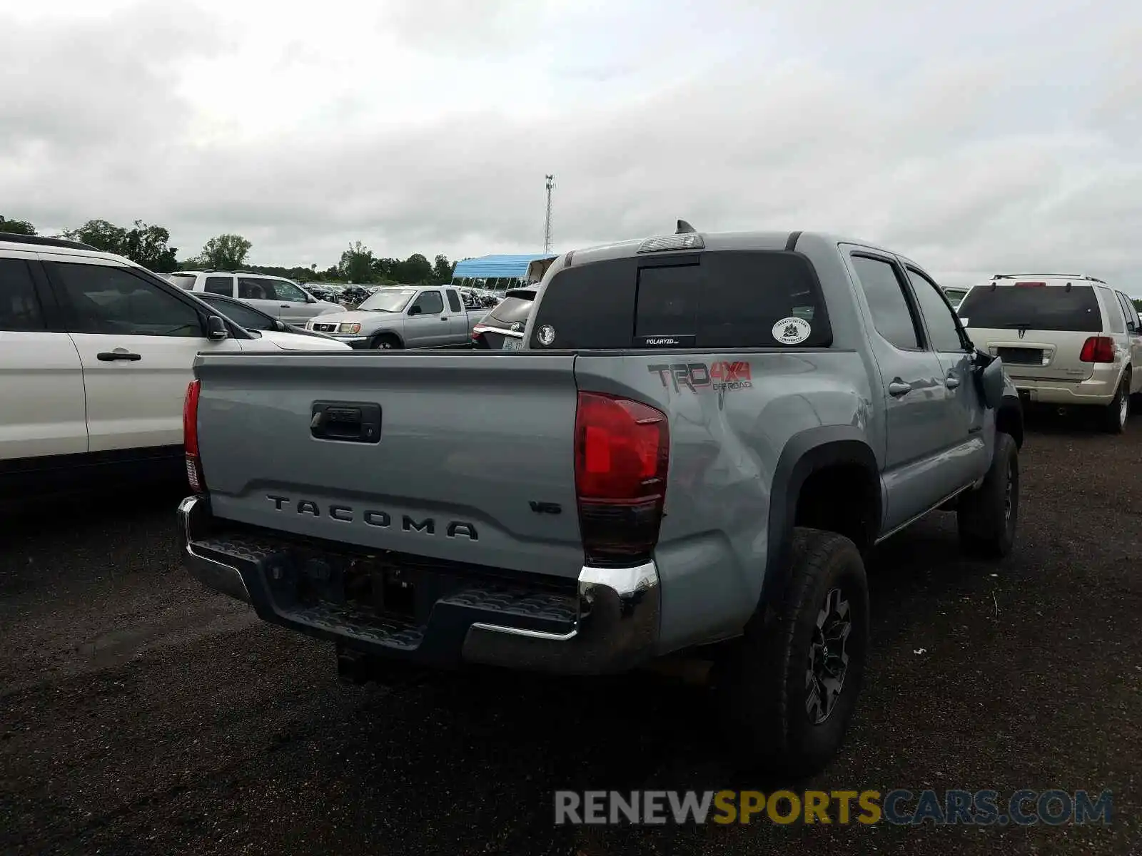 4 Photograph of a damaged car 3TMCZ5AN1KM247747 TOYOTA TACOMA 2019