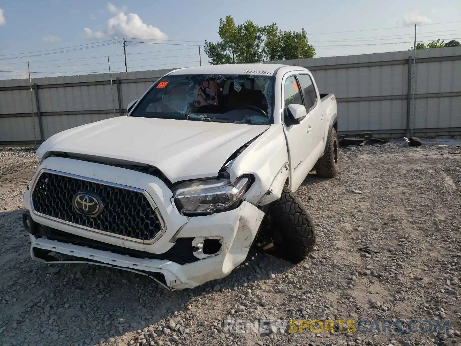 2 Photograph of a damaged car 3TMCZ5AN1KM249871 TOYOTA TACOMA 2019