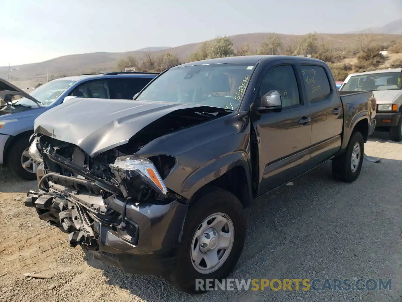 2 Photograph of a damaged car 3TMCZ5AN1KM250325 TOYOTA TACOMA 2019