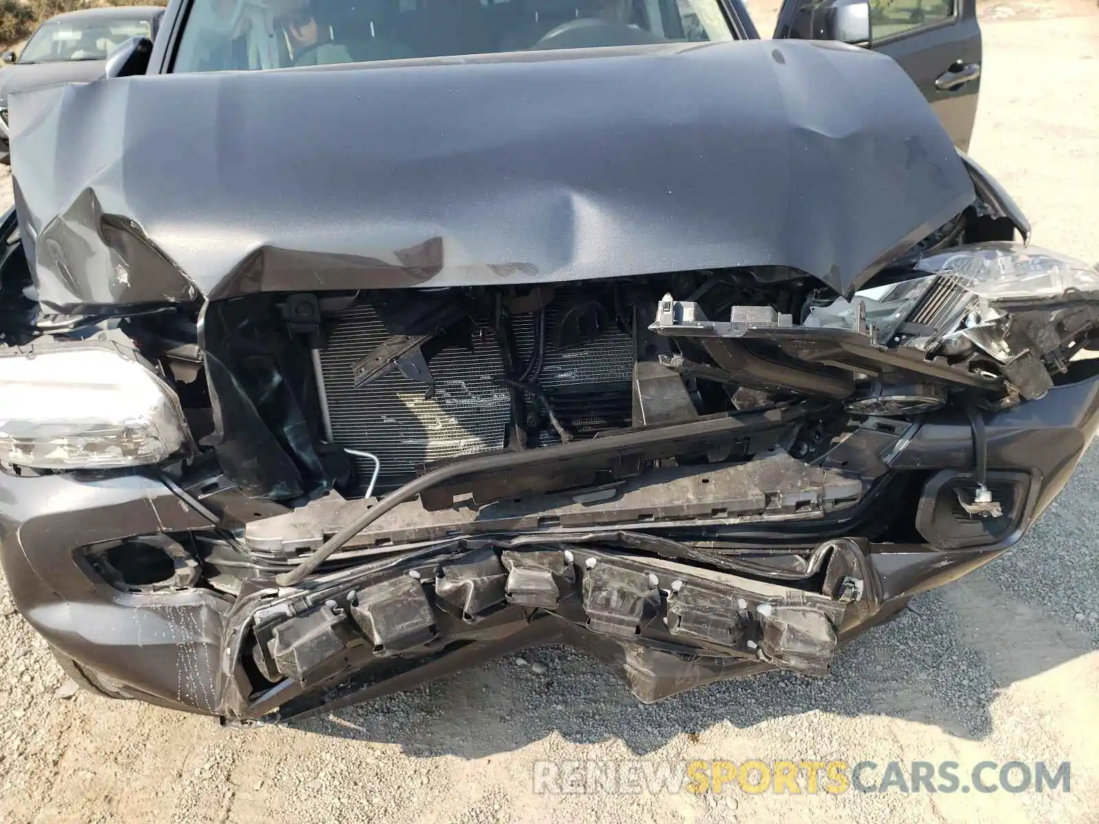 7 Photograph of a damaged car 3TMCZ5AN1KM250325 TOYOTA TACOMA 2019