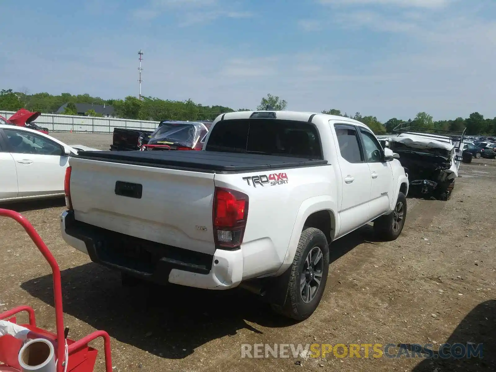 4 Photograph of a damaged car 3TMCZ5AN1KM252723 TOYOTA TACOMA 2019