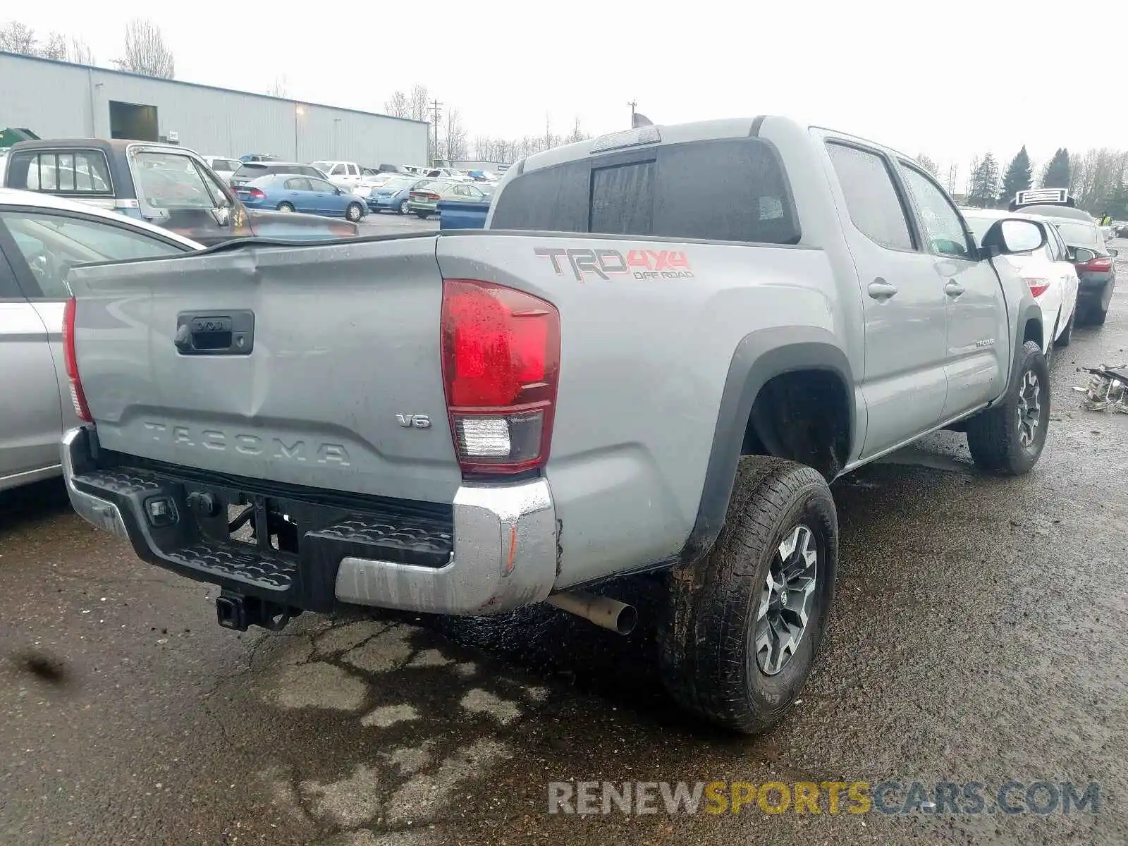 4 Photograph of a damaged car 3TMCZ5AN1KM255363 TOYOTA TACOMA 2019