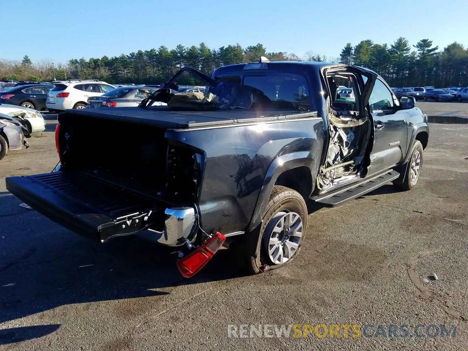 4 Photograph of a damaged car 3TMCZ5AN1KM255590 TOYOTA TACOMA 2019