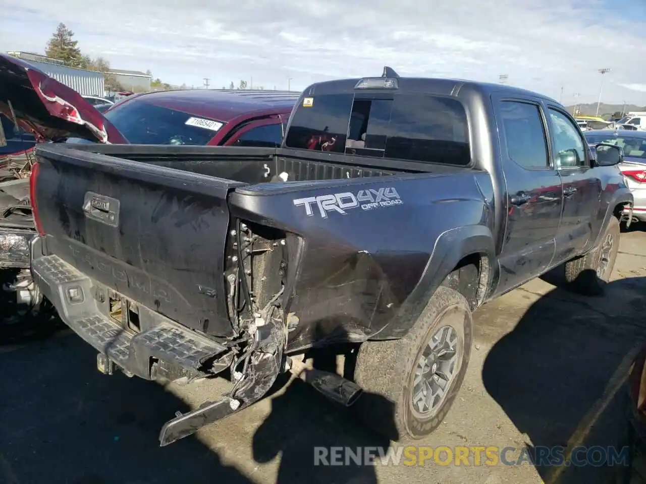 4 Photograph of a damaged car 3TMCZ5AN1KM256979 TOYOTA TACOMA 2019