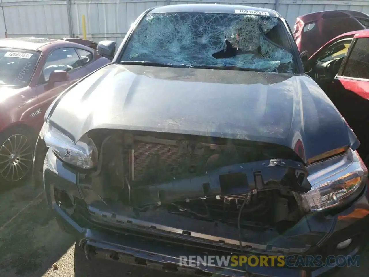 9 Photograph of a damaged car 3TMCZ5AN1KM256979 TOYOTA TACOMA 2019