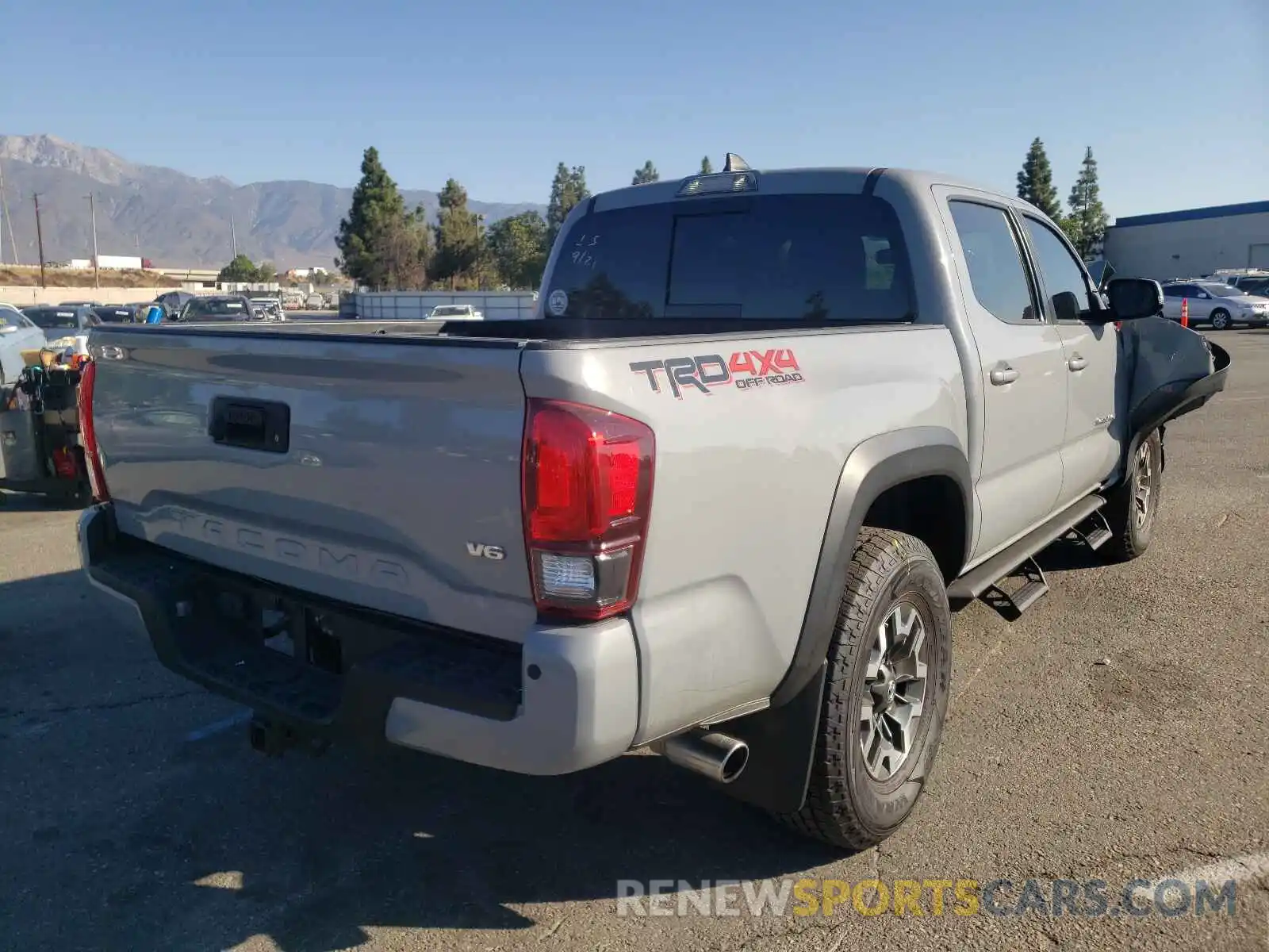 4 Photograph of a damaged car 3TMCZ5AN1KM272258 TOYOTA TACOMA 2019