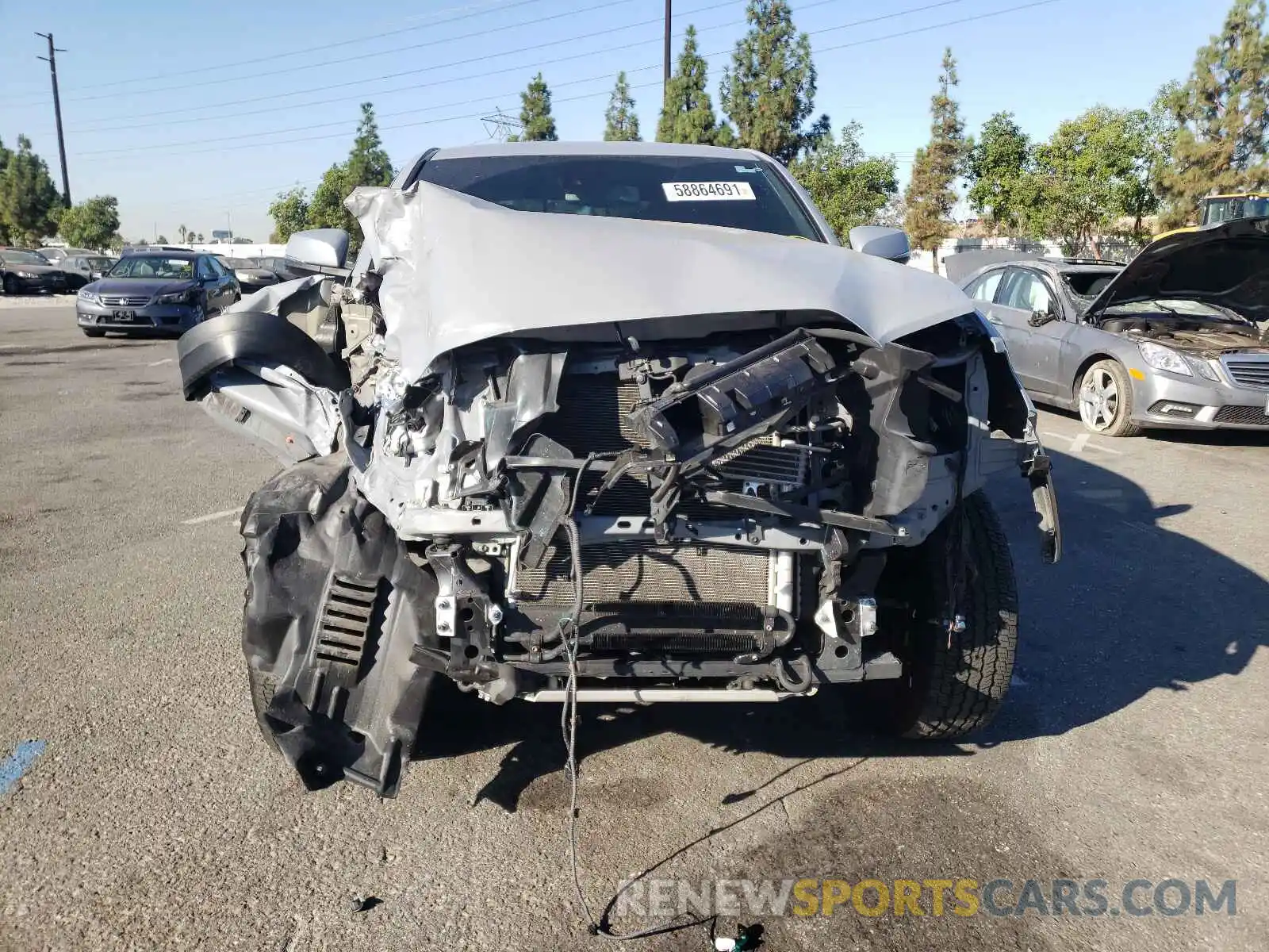 9 Photograph of a damaged car 3TMCZ5AN1KM272258 TOYOTA TACOMA 2019