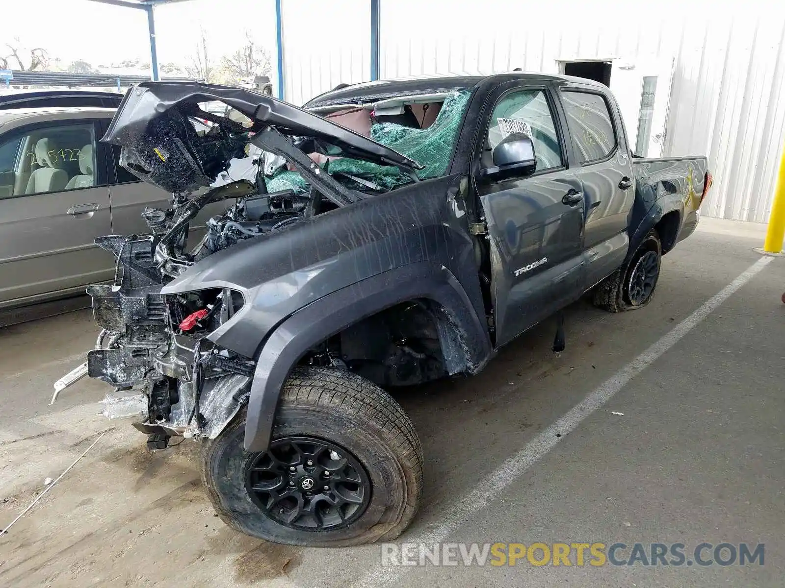 2 Photograph of a damaged car 3TMCZ5AN1KM278688 TOYOTA TACOMA 2019