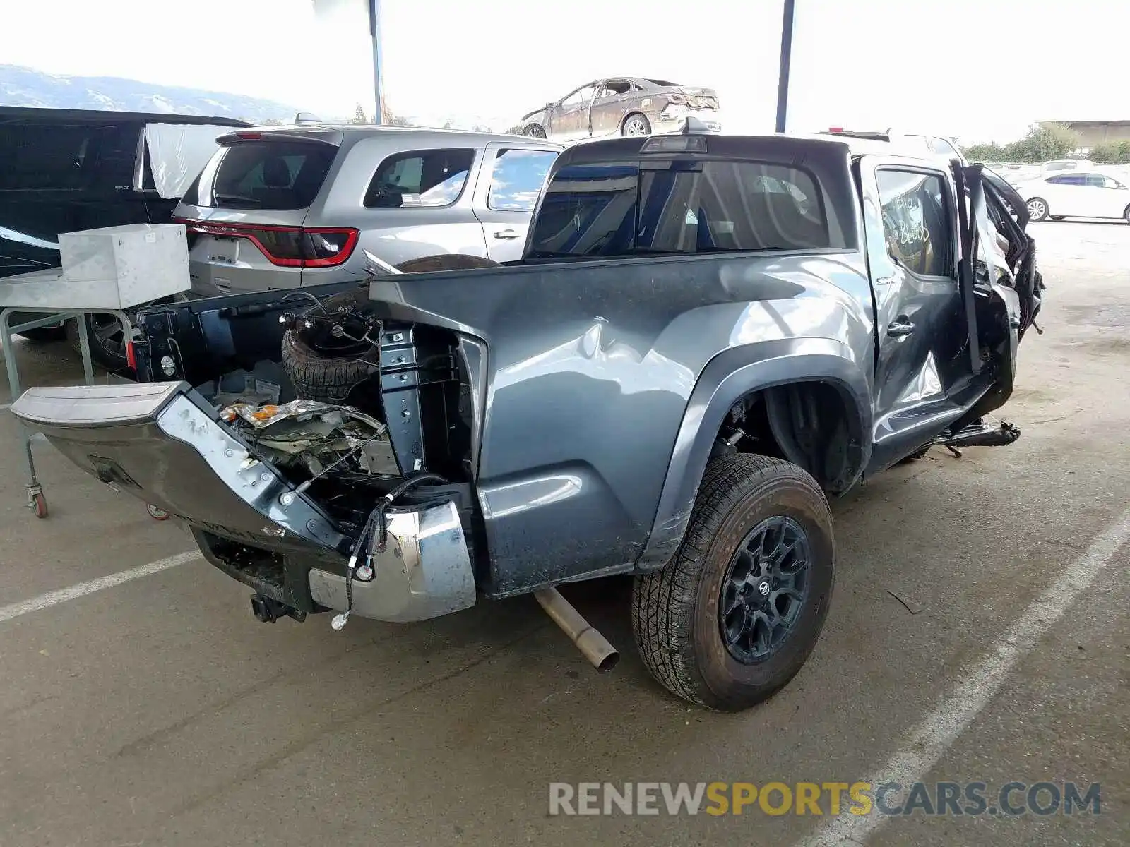 4 Photograph of a damaged car 3TMCZ5AN1KM278688 TOYOTA TACOMA 2019