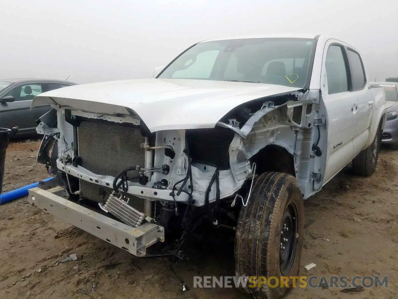 2 Photograph of a damaged car 3TMCZ5AN1KM279839 TOYOTA TACOMA 2019