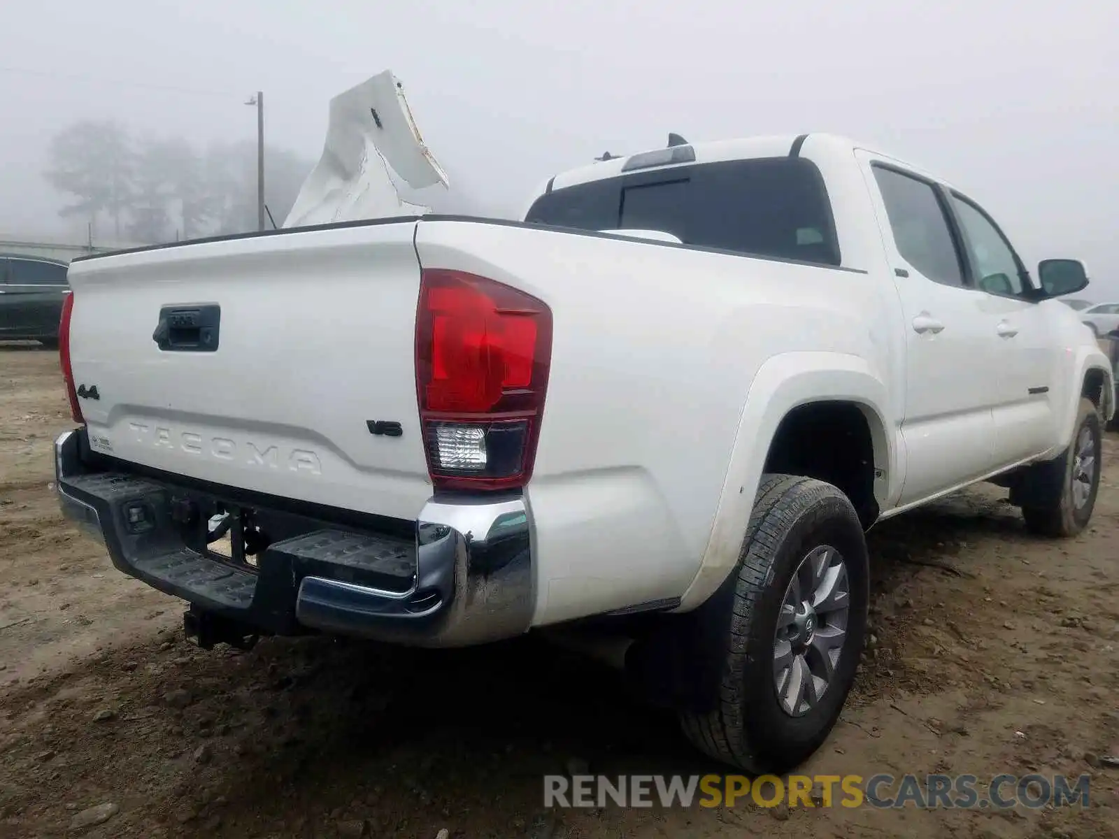 4 Photograph of a damaged car 3TMCZ5AN1KM279839 TOYOTA TACOMA 2019