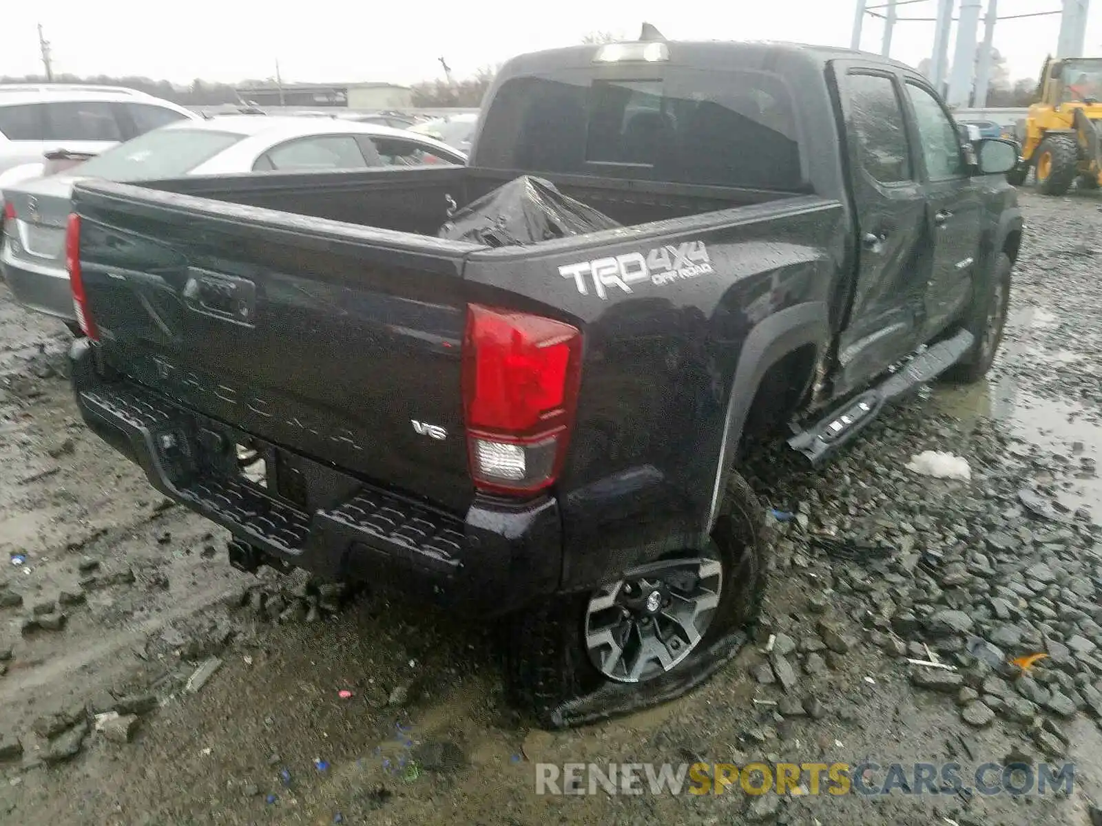 4 Photograph of a damaged car 3TMCZ5AN1KM280778 TOYOTA TACOMA 2019