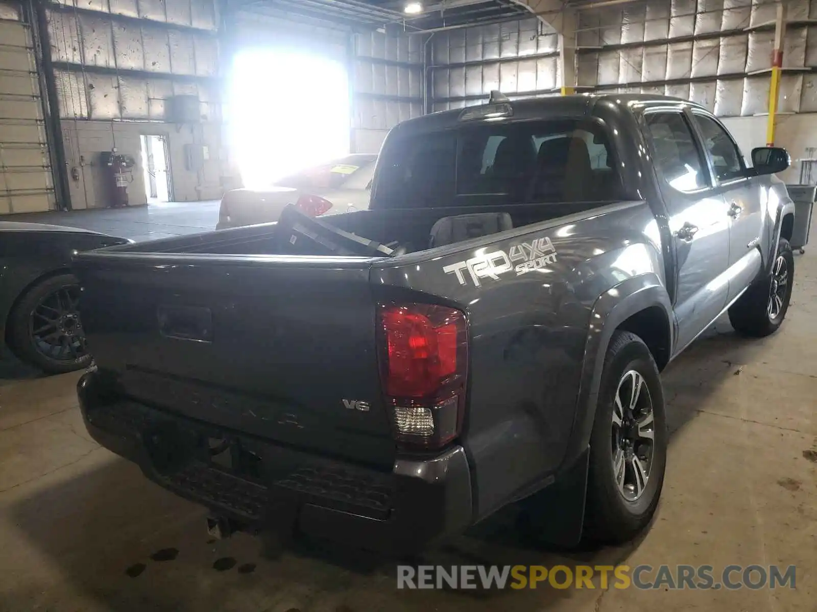 4 Photograph of a damaged car 3TMCZ5AN1KM283924 TOYOTA TACOMA 2019