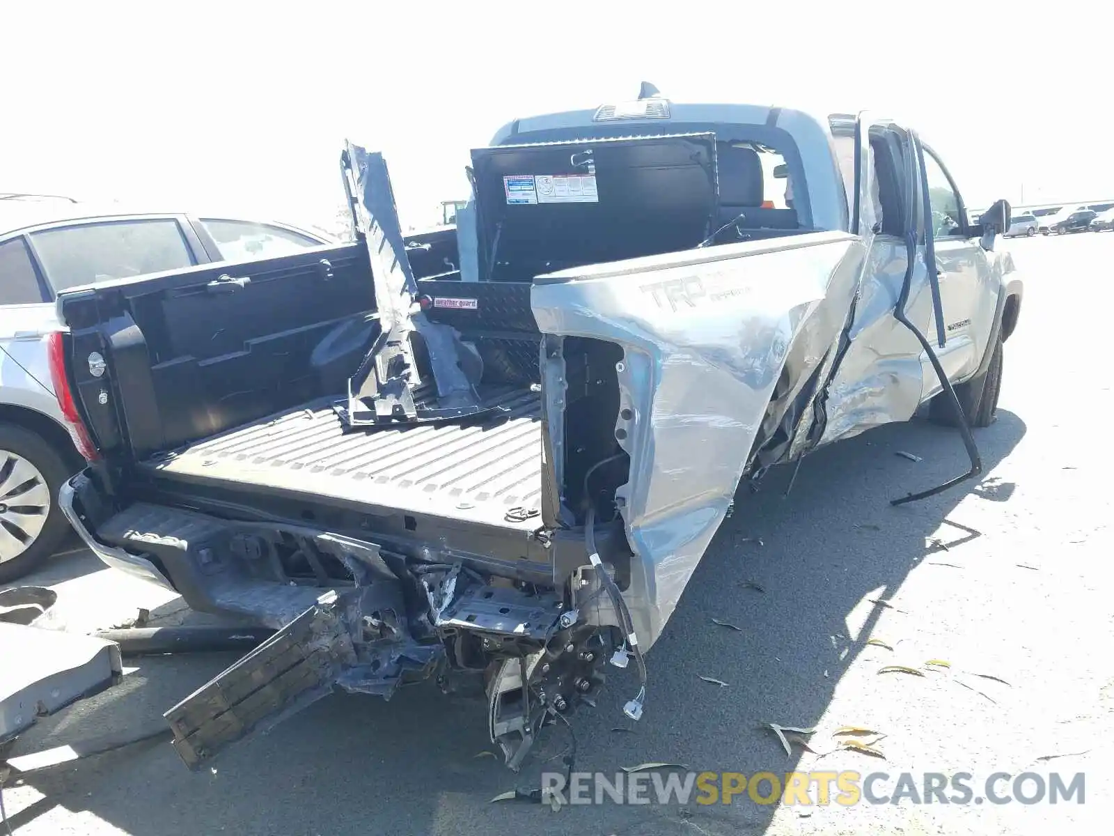 4 Photograph of a damaged car 3TMCZ5AN1KM287617 TOYOTA TACOMA 2019