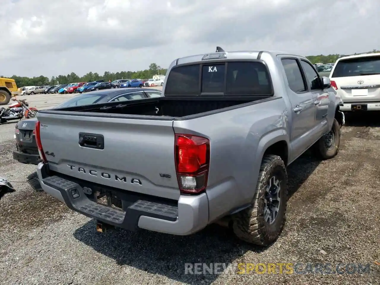 4 Photograph of a damaged car 3TMCZ5AN2KM189504 TOYOTA TACOMA 2019