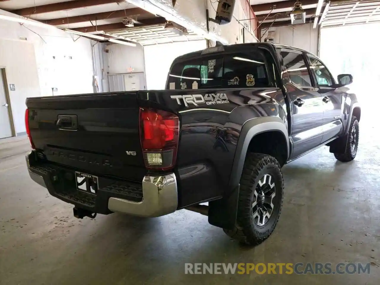 4 Photograph of a damaged car 3TMCZ5AN2KM190443 TOYOTA TACOMA 2019