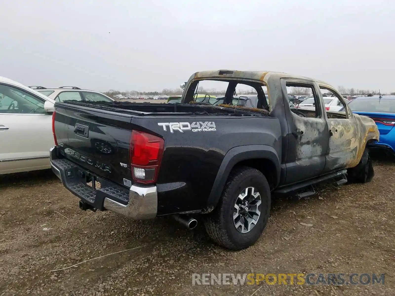 4 Photograph of a damaged car 3TMCZ5AN2KM190989 TOYOTA TACOMA 2019