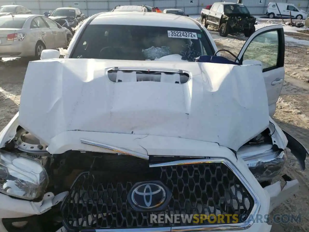 7 Photograph of a damaged car 3TMCZ5AN2KM191303 TOYOTA TACOMA 2019