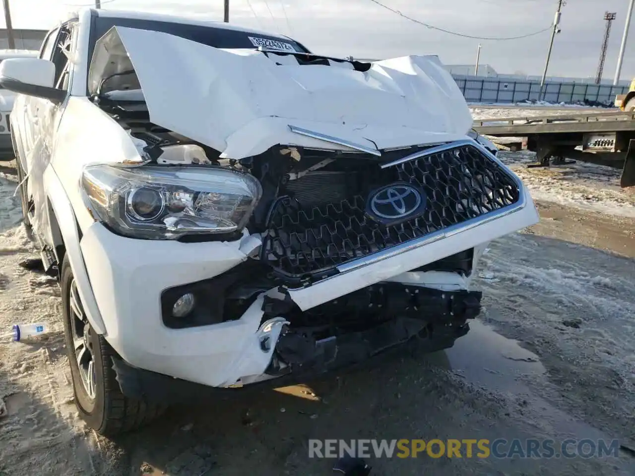 9 Photograph of a damaged car 3TMCZ5AN2KM191303 TOYOTA TACOMA 2019