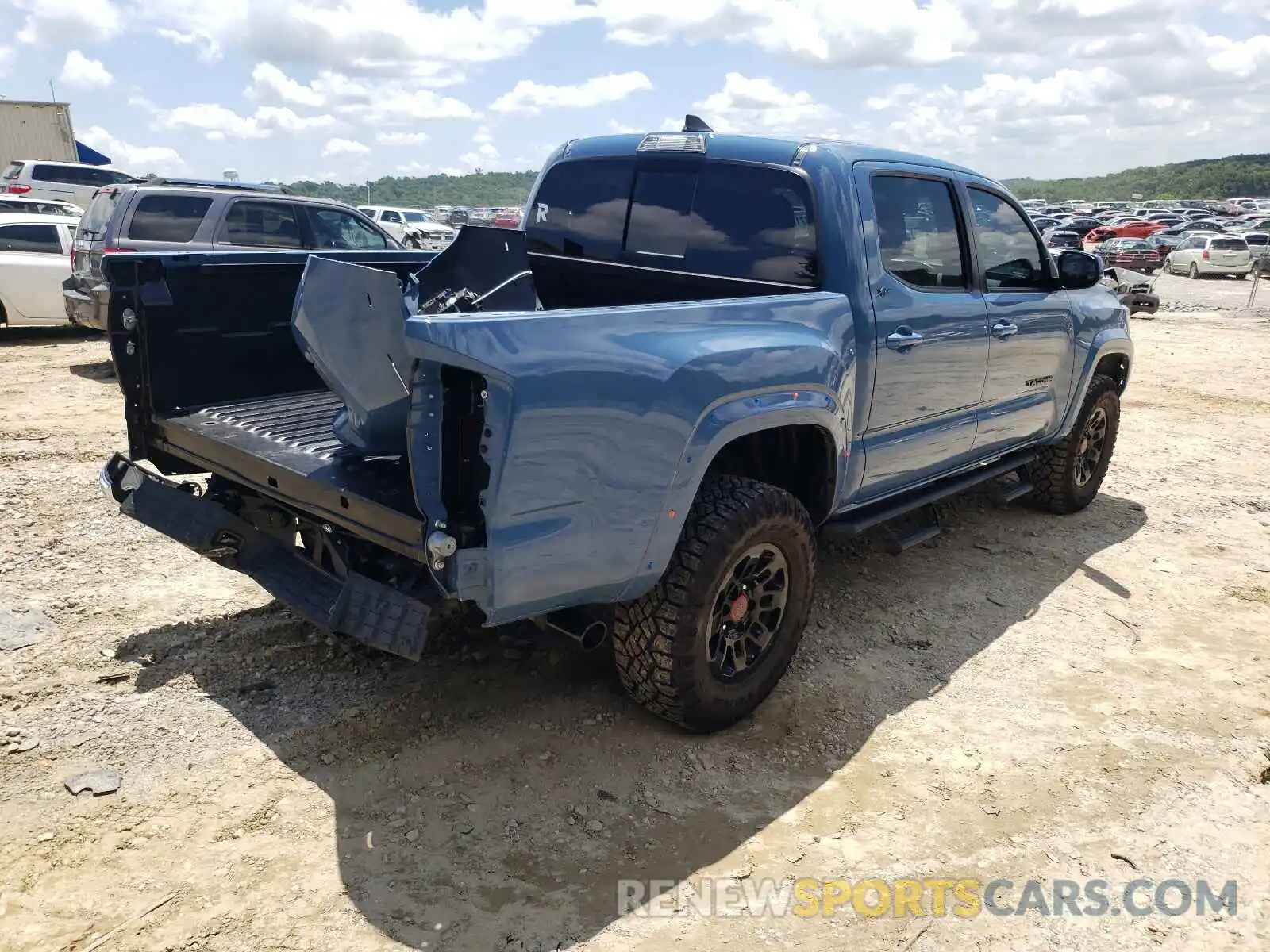 4 Photograph of a damaged car 3TMCZ5AN2KM194007 TOYOTA TACOMA 2019