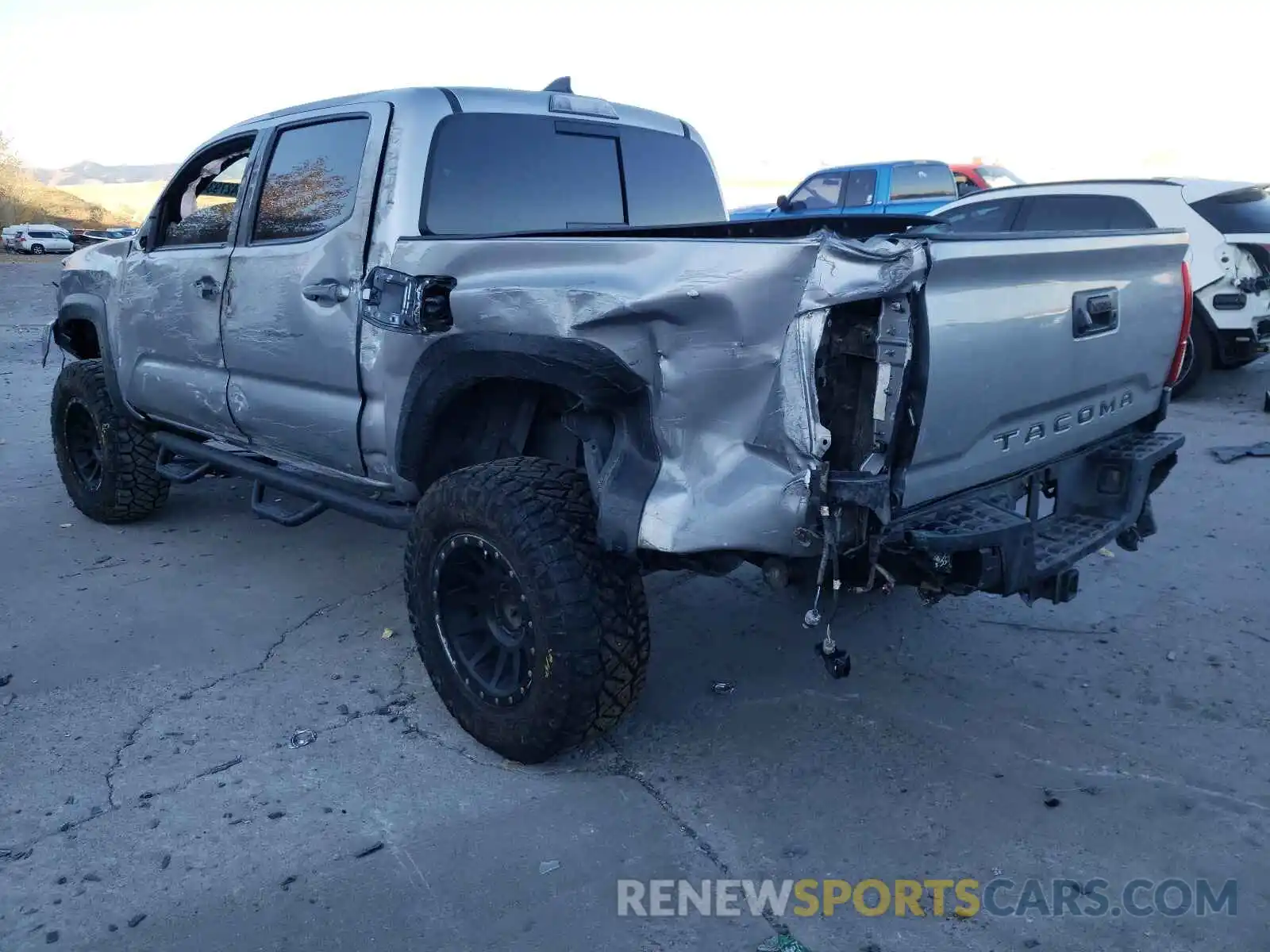 3 Photograph of a damaged car 3TMCZ5AN2KM195917 TOYOTA TACOMA 2019