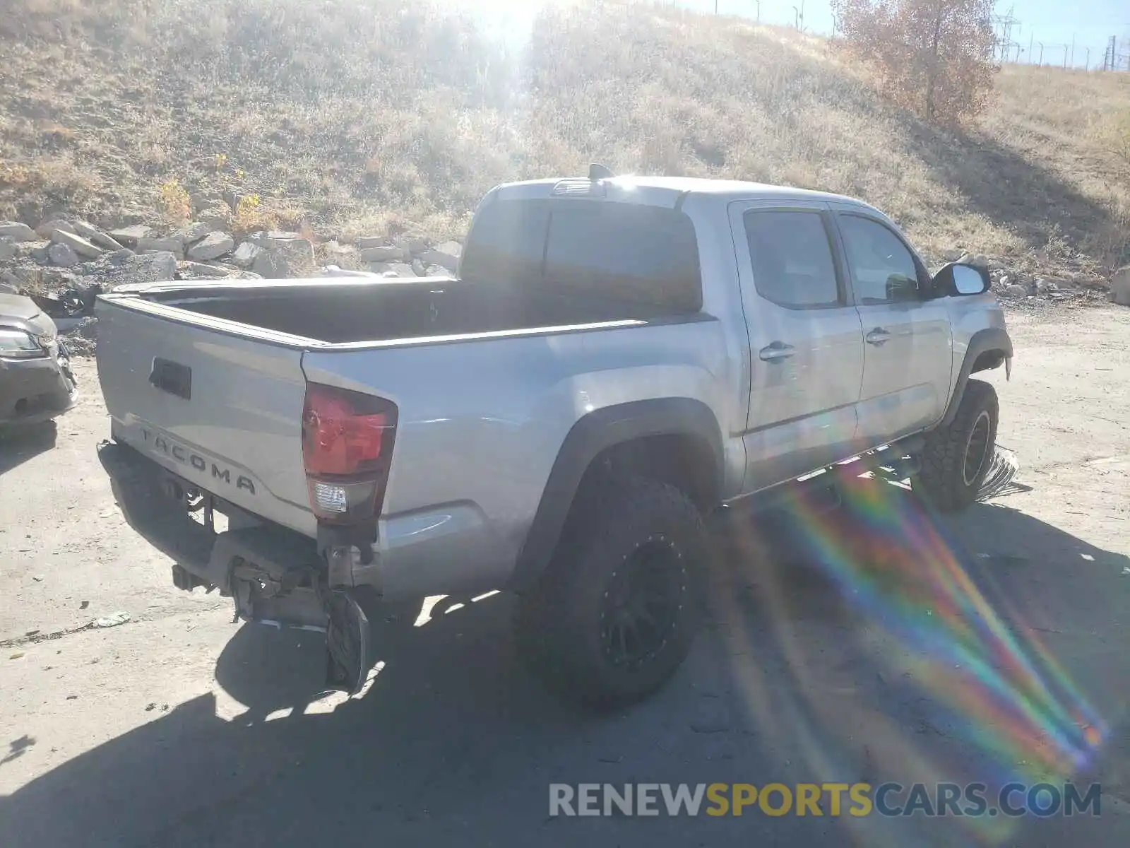 4 Photograph of a damaged car 3TMCZ5AN2KM195917 TOYOTA TACOMA 2019