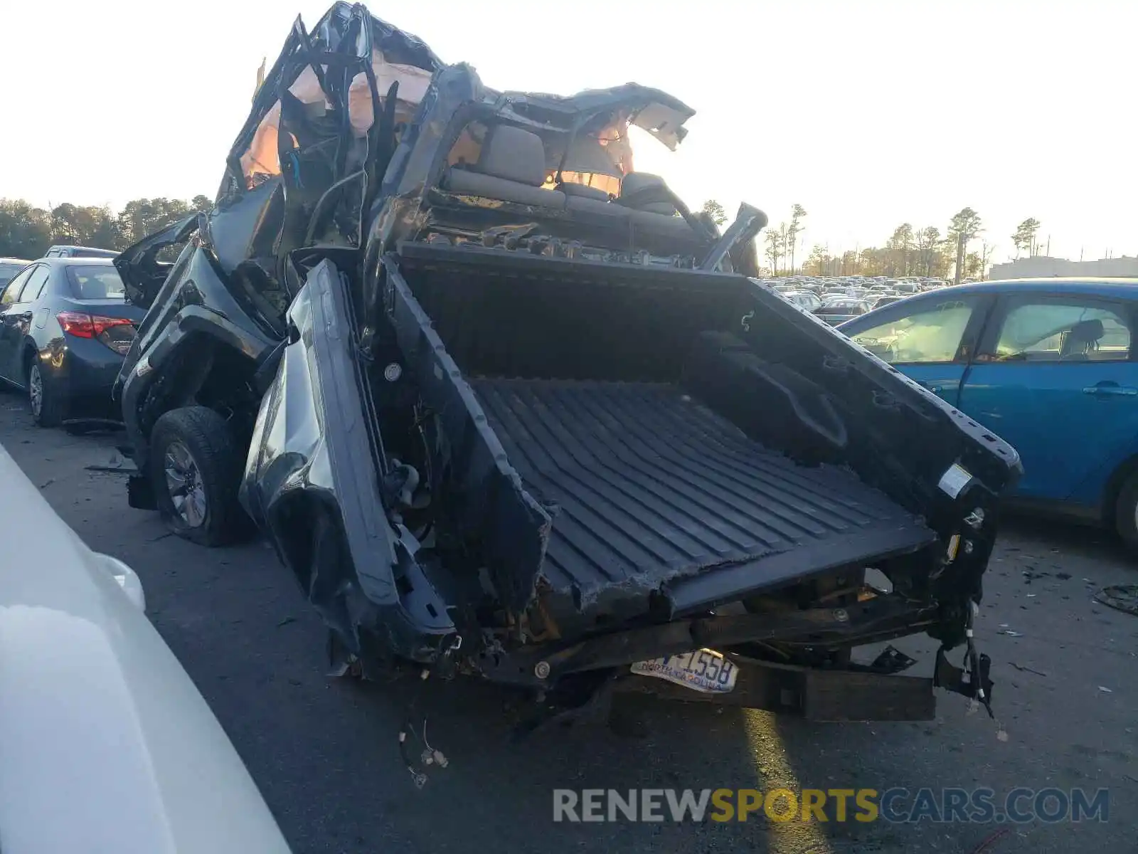 3 Photograph of a damaged car 3TMCZ5AN2KM198493 TOYOTA TACOMA 2019