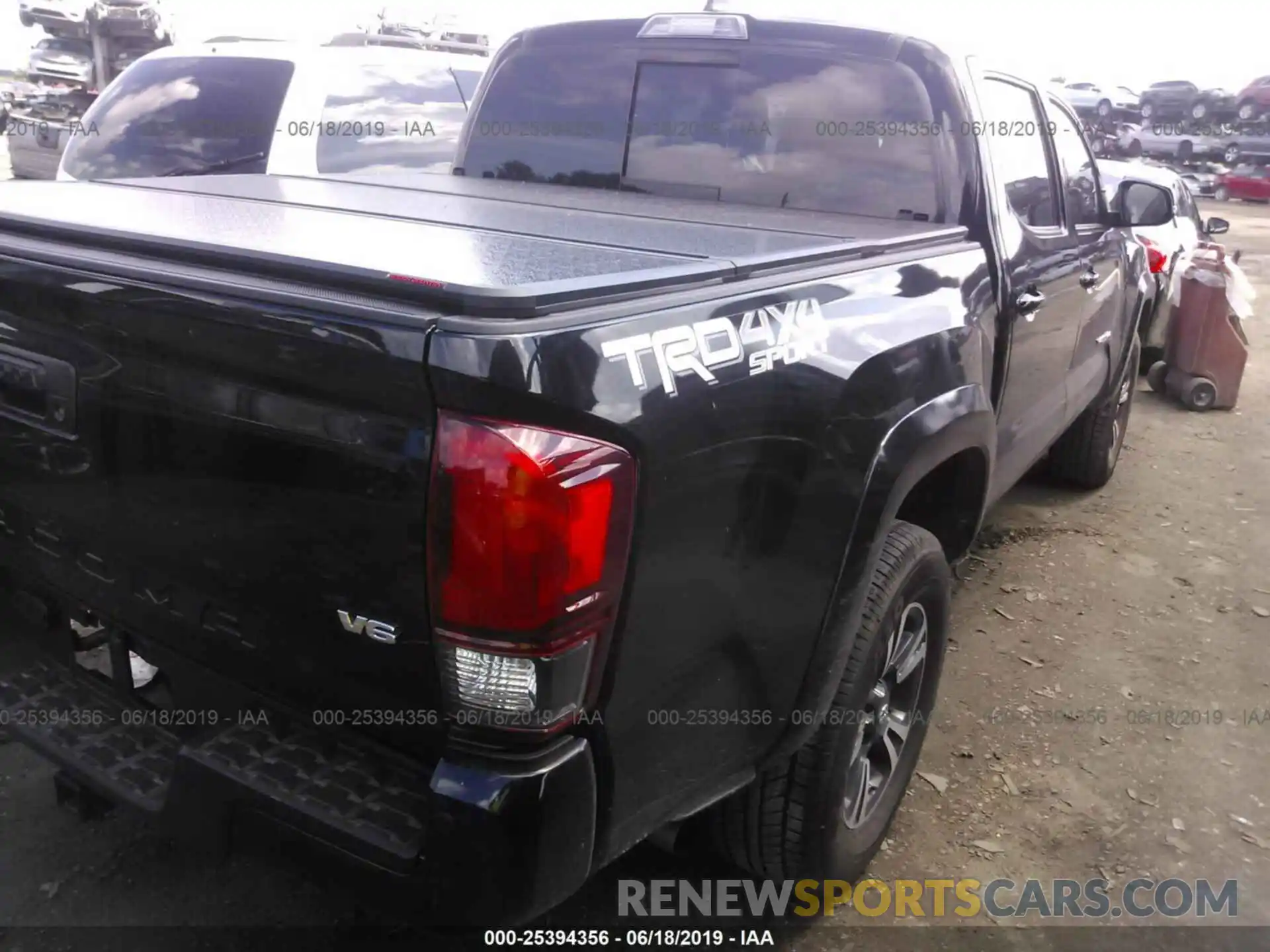 4 Photograph of a damaged car 3TMCZ5AN2KM201862 TOYOTA TACOMA 2019