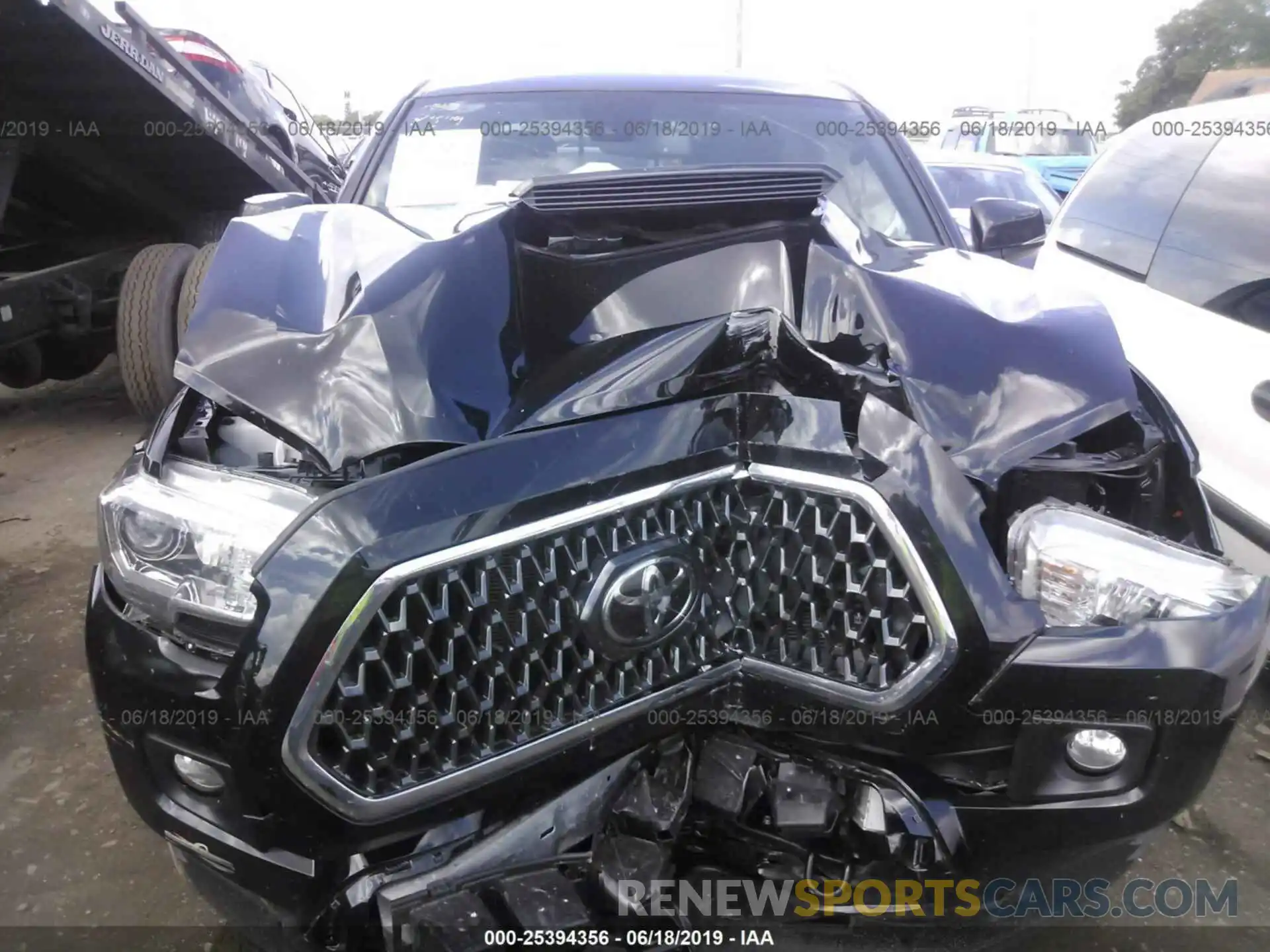 6 Photograph of a damaged car 3TMCZ5AN2KM201862 TOYOTA TACOMA 2019