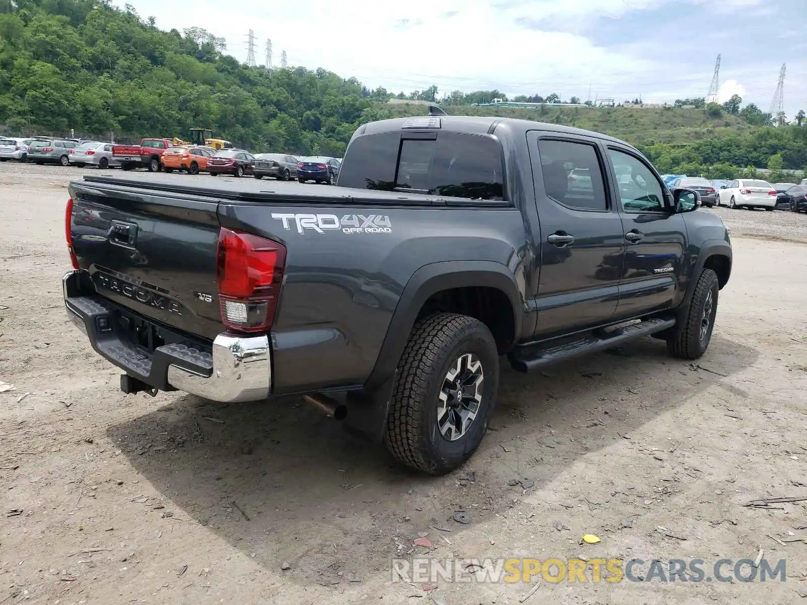 4 Photograph of a damaged car 3TMCZ5AN2KM204051 TOYOTA TACOMA 2019