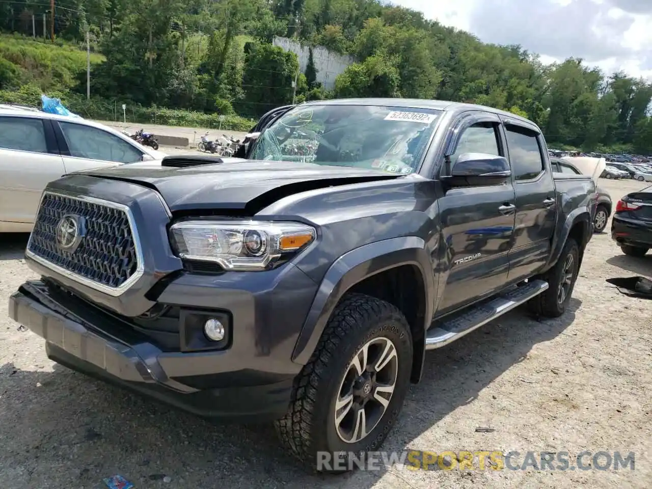 2 Photograph of a damaged car 3TMCZ5AN2KM205068 TOYOTA TACOMA 2019