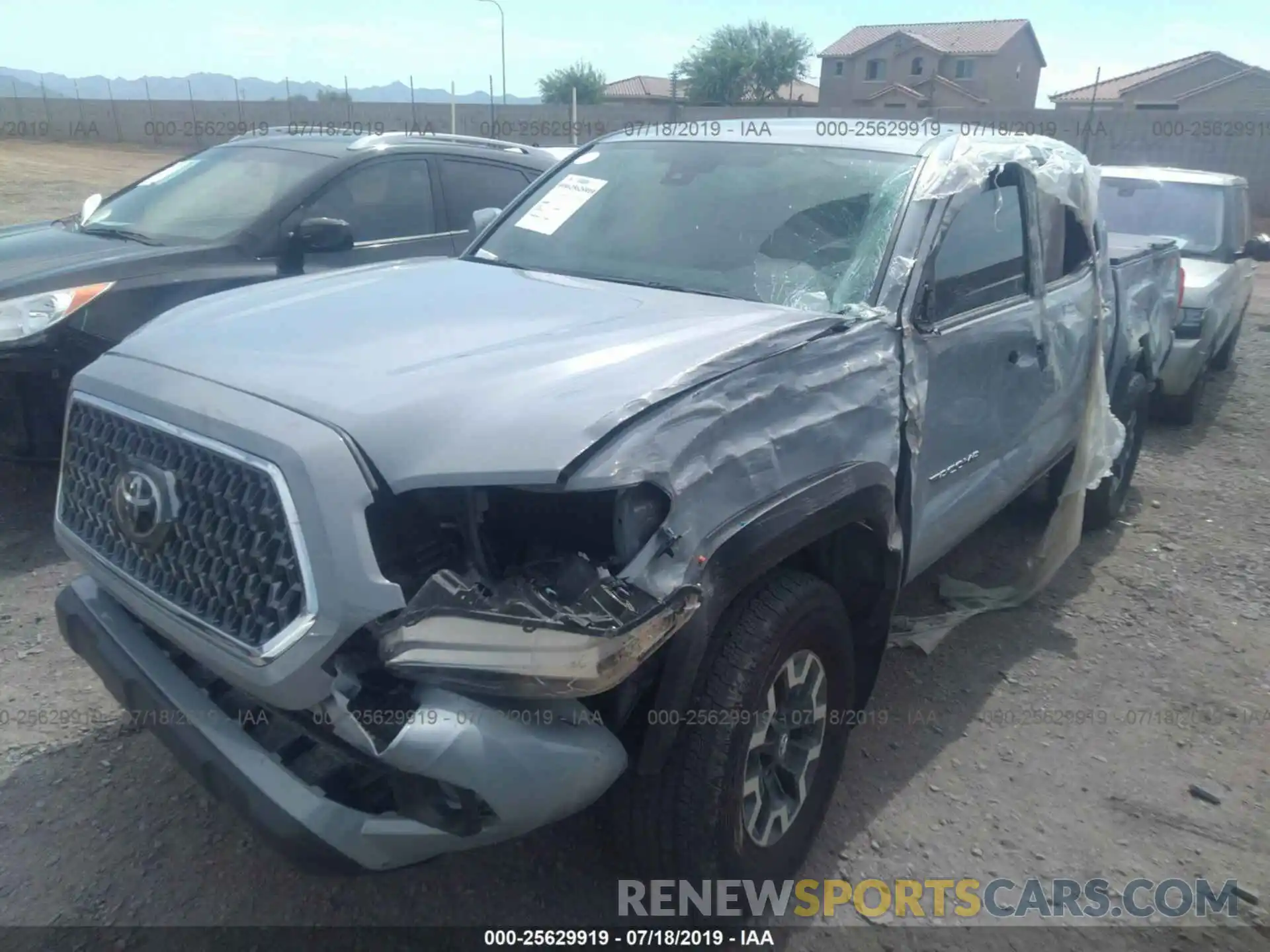 2 Photograph of a damaged car 3TMCZ5AN2KM208939 TOYOTA TACOMA 2019