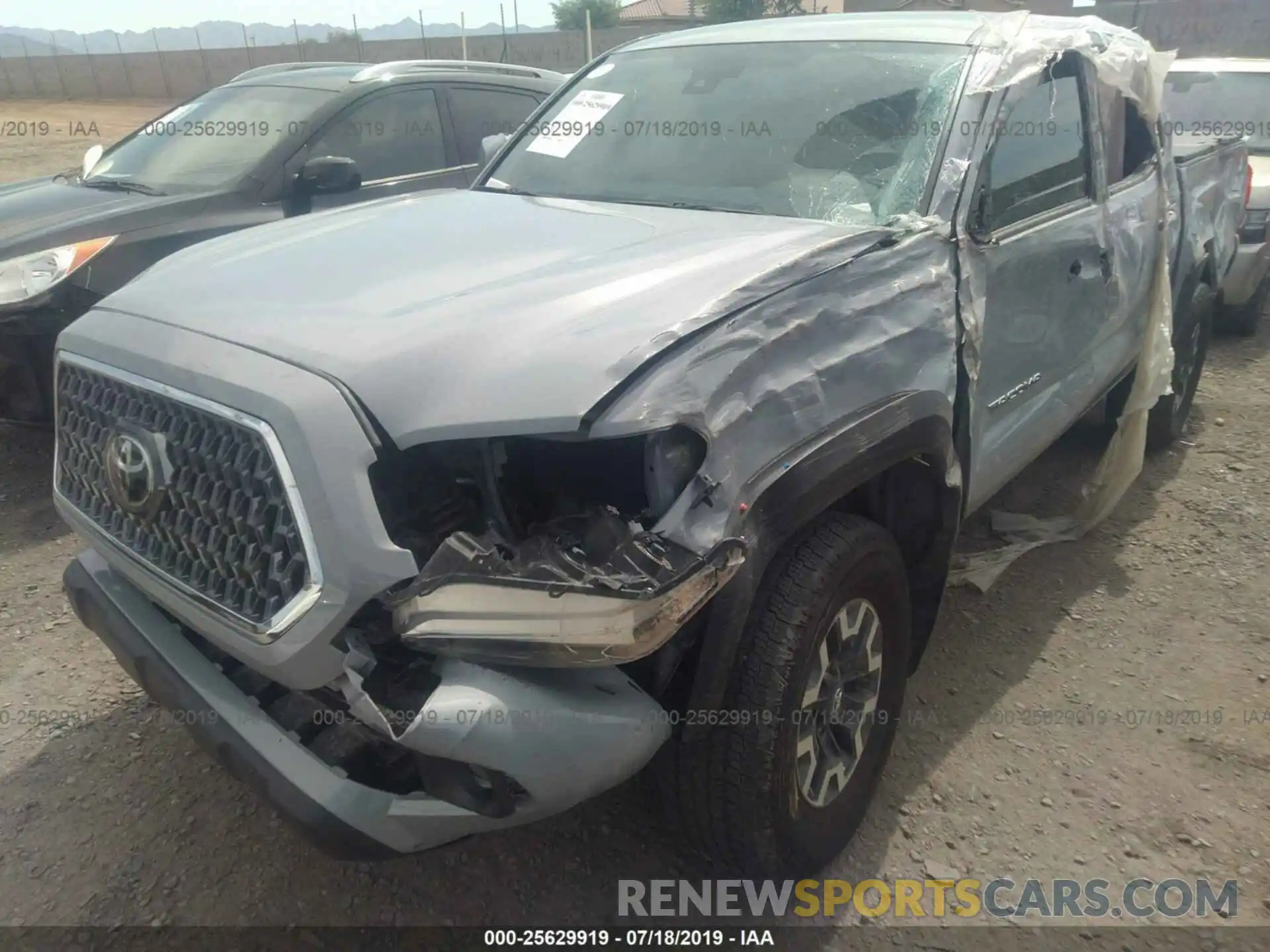 6 Photograph of a damaged car 3TMCZ5AN2KM208939 TOYOTA TACOMA 2019