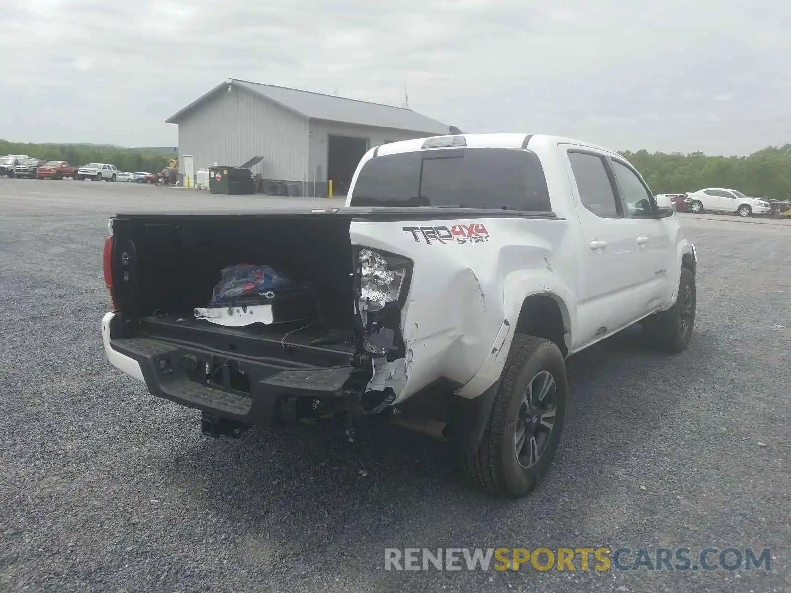 4 Photograph of a damaged car 3TMCZ5AN2KM209668 TOYOTA TACOMA 2019