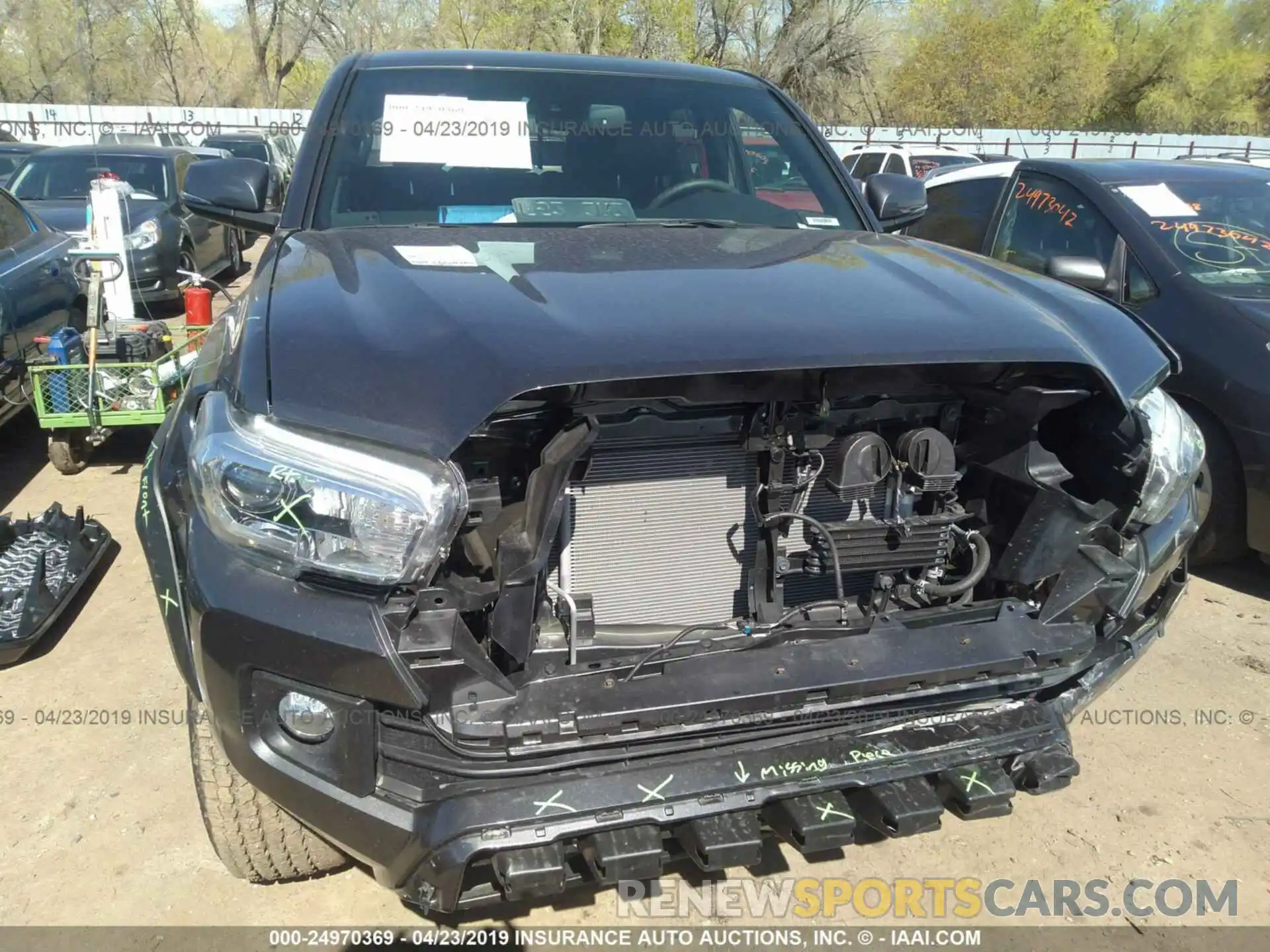 6 Photograph of a damaged car 3TMCZ5AN2KM212604 TOYOTA TACOMA 2019