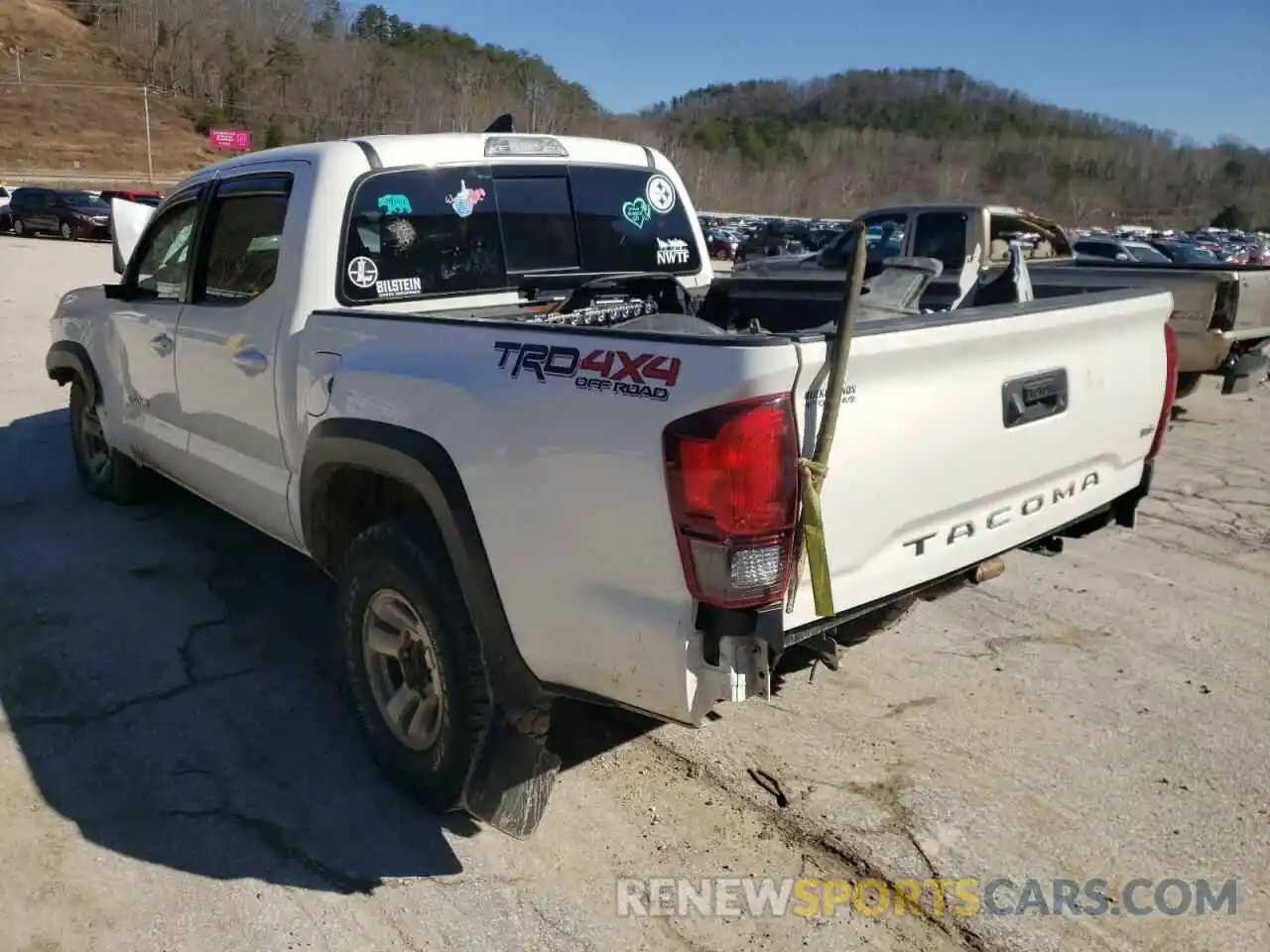 3 Photograph of a damaged car 3TMCZ5AN2KM215809 TOYOTA TACOMA 2019