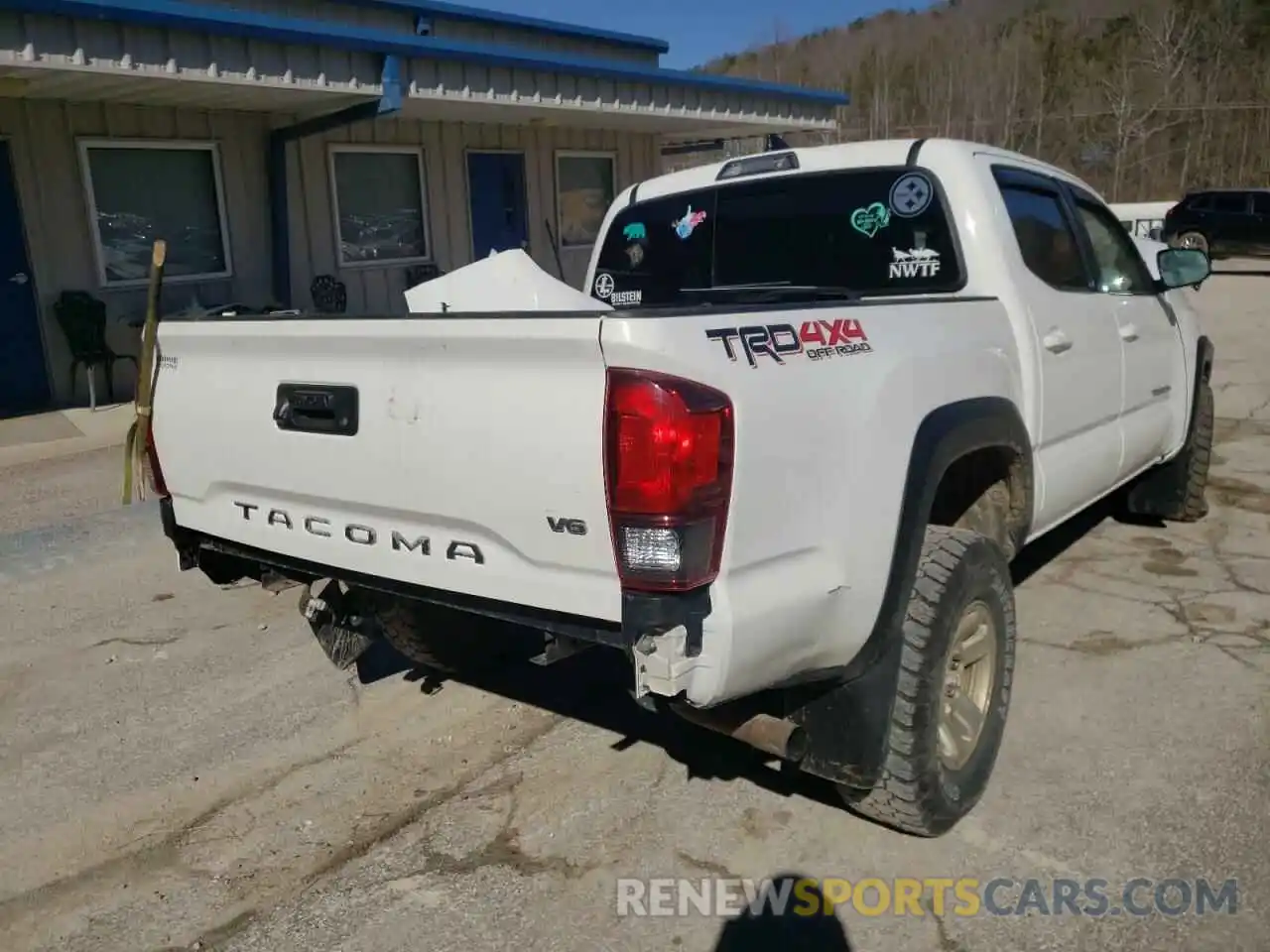 4 Photograph of a damaged car 3TMCZ5AN2KM215809 TOYOTA TACOMA 2019