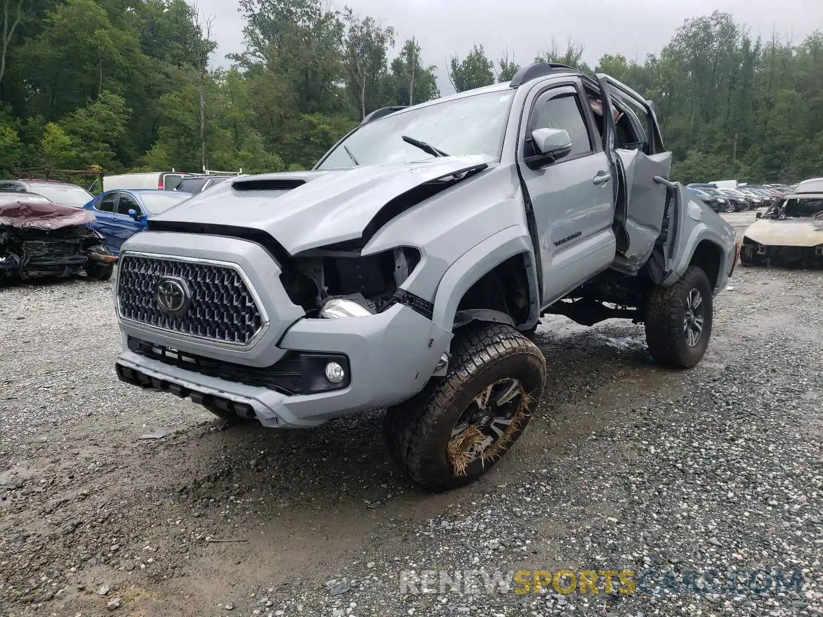 2 Photograph of a damaged car 3TMCZ5AN2KM215860 TOYOTA TACOMA 2019