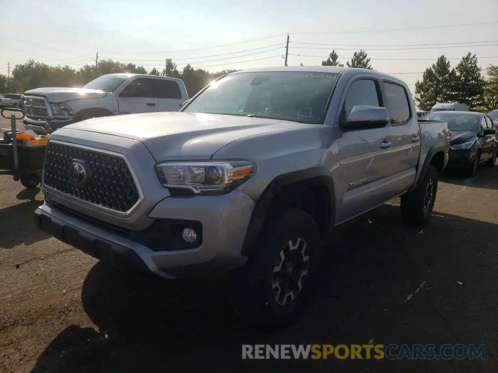 2 Photograph of a damaged car 3TMCZ5AN2KM221271 TOYOTA TACOMA 2019