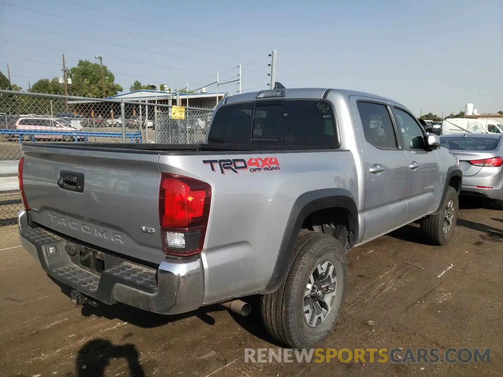 4 Photograph of a damaged car 3TMCZ5AN2KM221271 TOYOTA TACOMA 2019