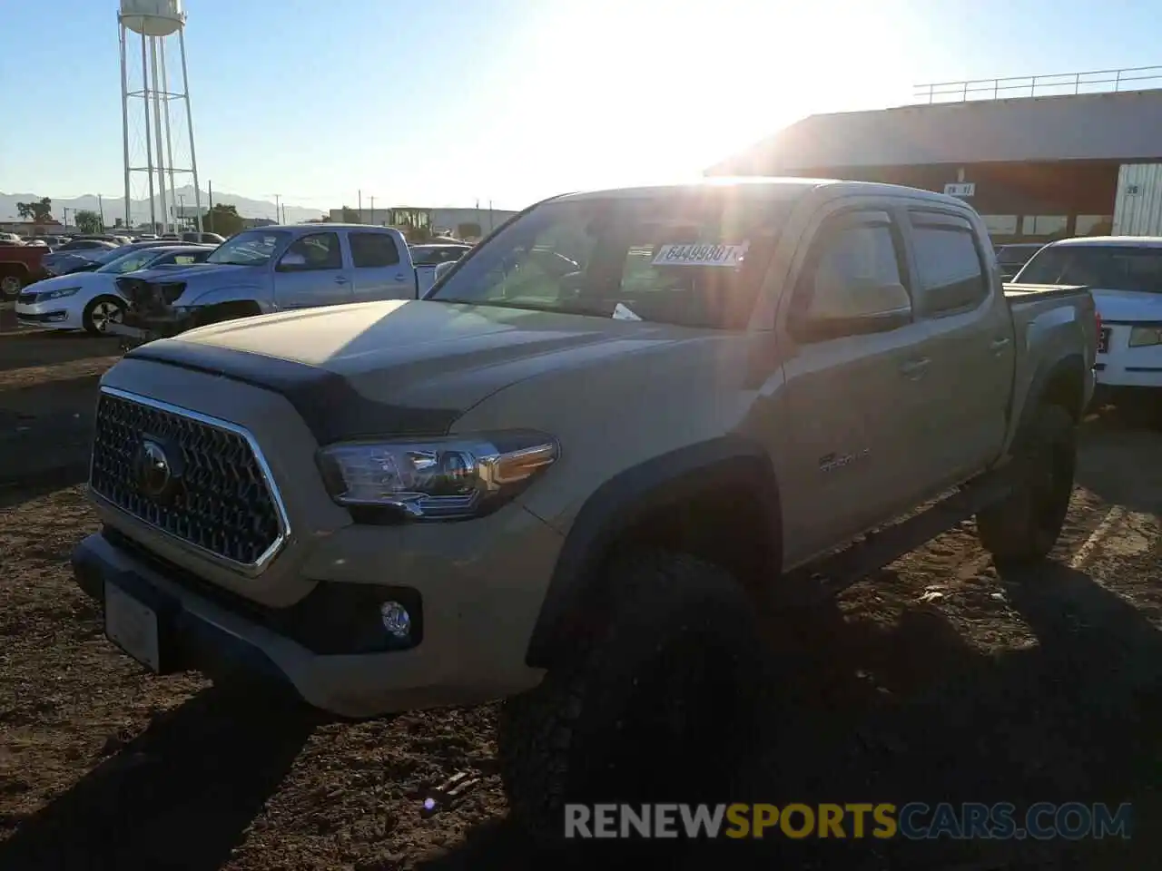 2 Photograph of a damaged car 3TMCZ5AN2KM223943 TOYOTA TACOMA 2019